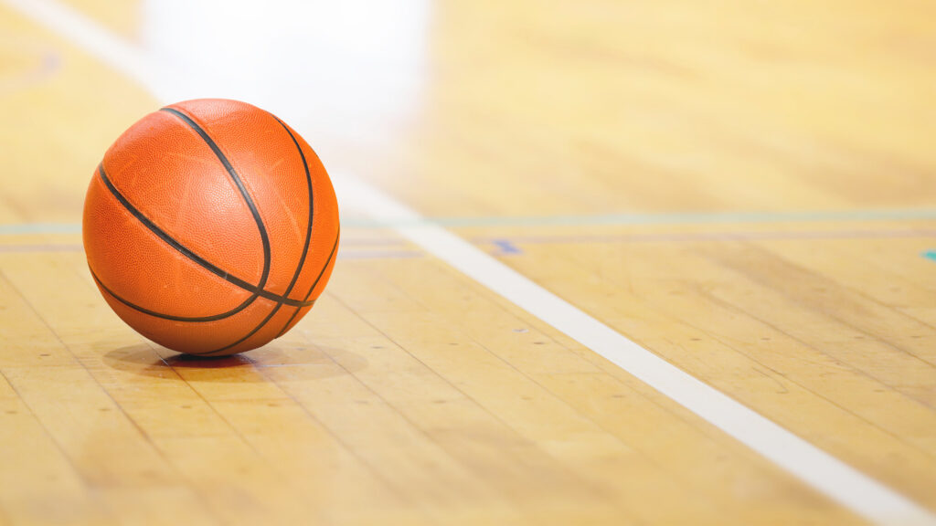 basketball on court showing bouncing back from failure