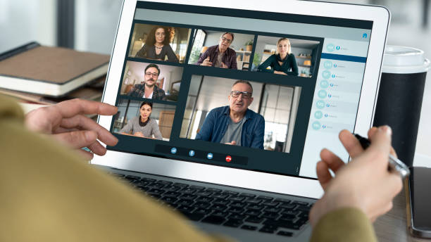 People talking and working on the computer